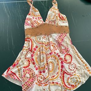 Halter top with leather studded details.